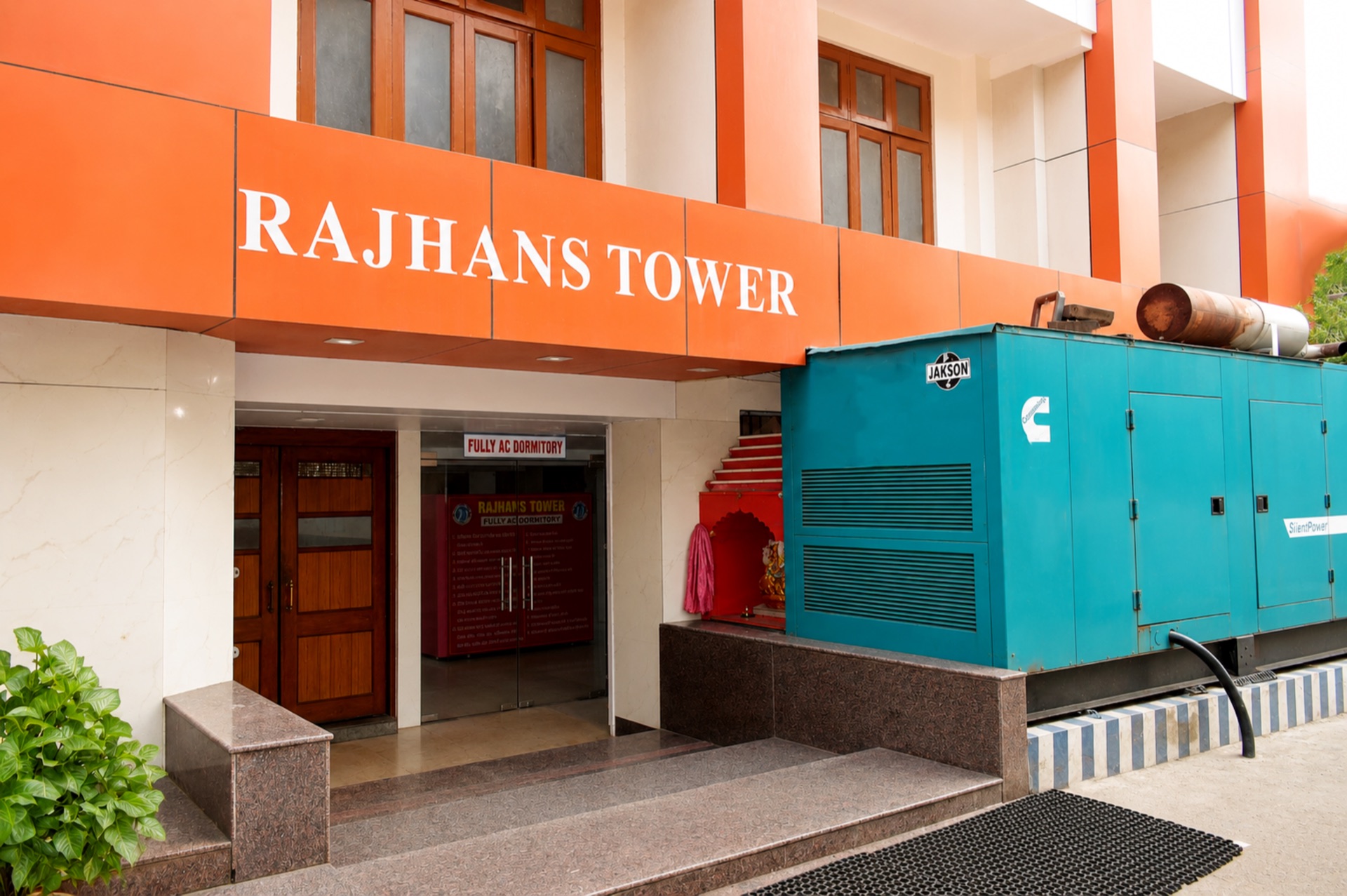 Rajhans Tower dormitory entrance with 24/7 heavy-duty power backup generator